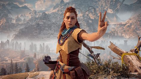 A Screenshot Of Aloy From Horizon Zero Dawn Doing The Peace Sign In The A Screenshot Of Aloy From Horizon Zero Dawn Doing The Peace Sign In The
