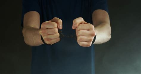 White Male In Handcuffs Pushes Fists Towards Stock Footage Sbv White Male In Handcuffs Pushes Fists Towards Stock Footage Sbv